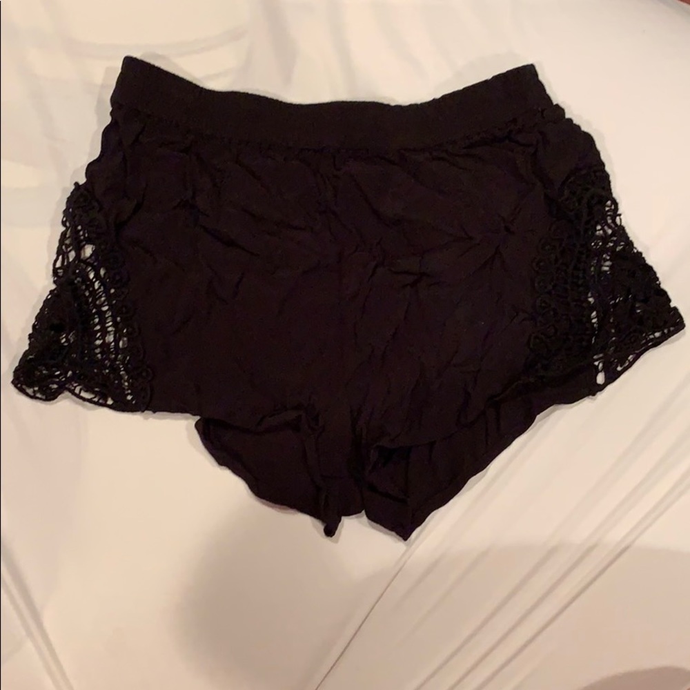 Black shorts, sides are lace